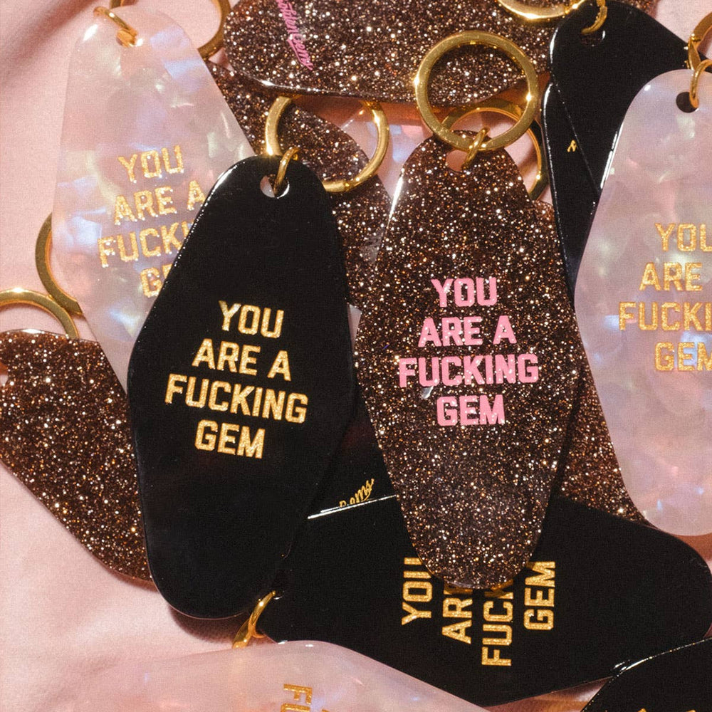 You Are A Fucking Gem Motel Keychain in Black
